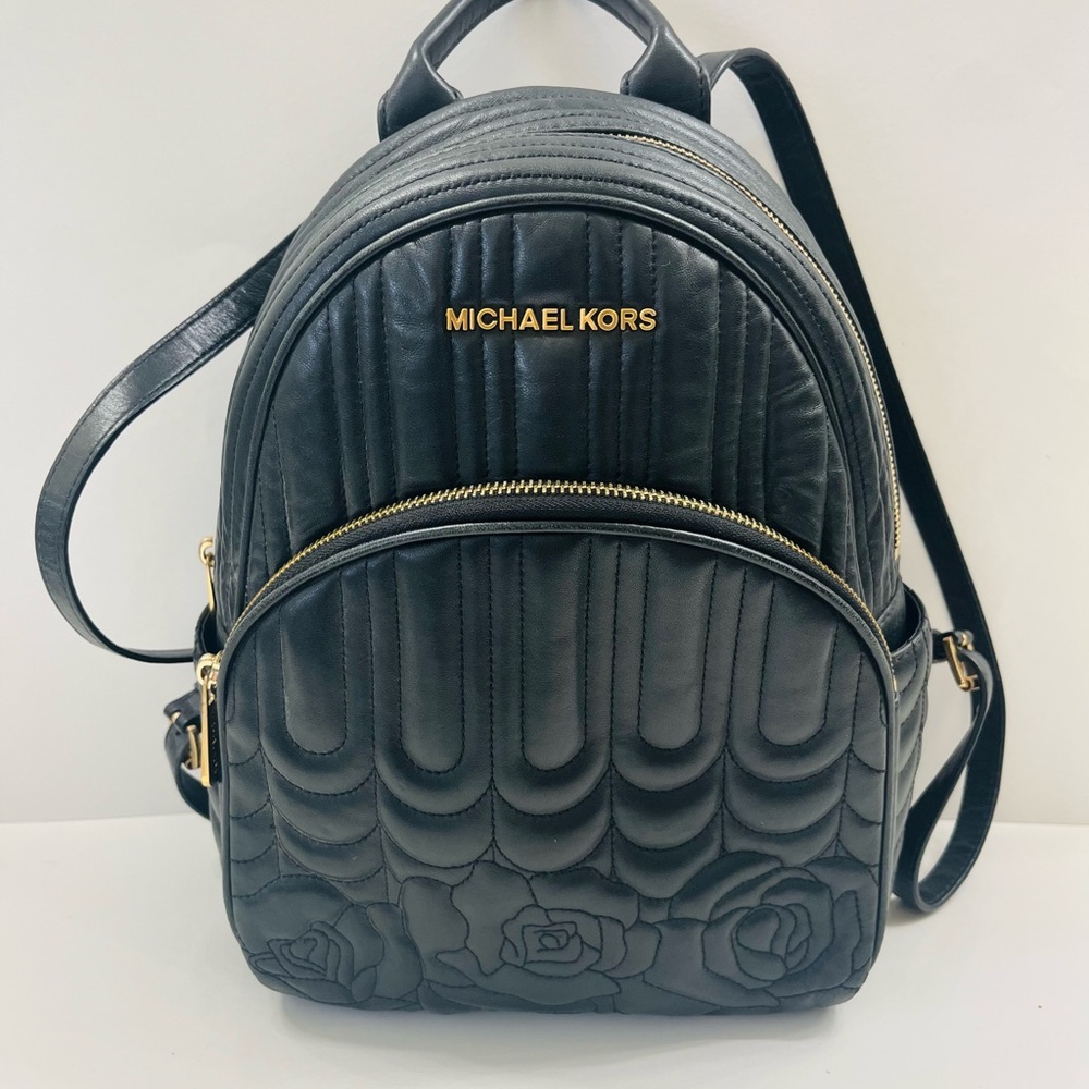 Michael Kors Black and Gold Quilted Mini Backpack